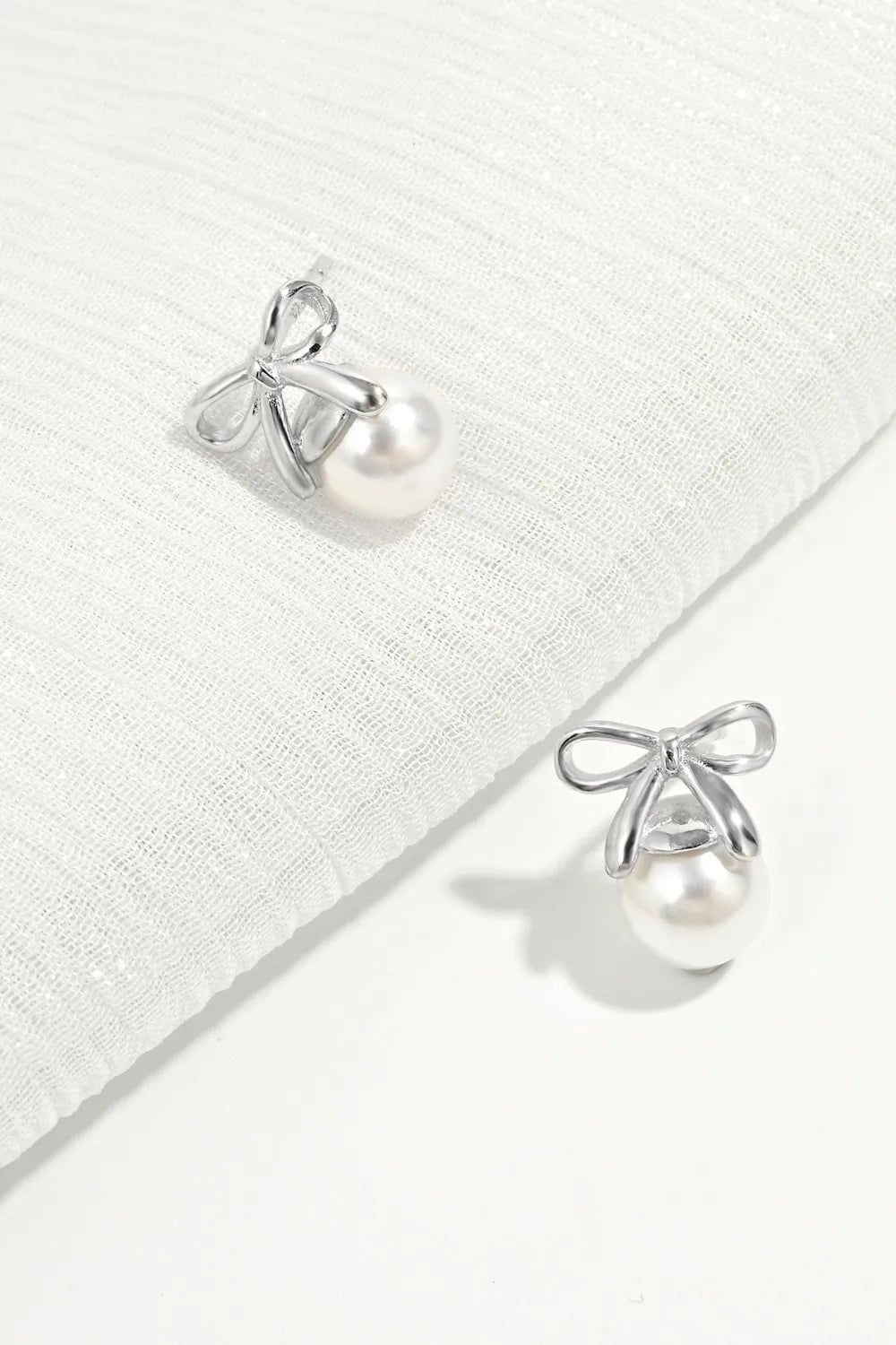 Sterling Silver Pearl Bow Earrings