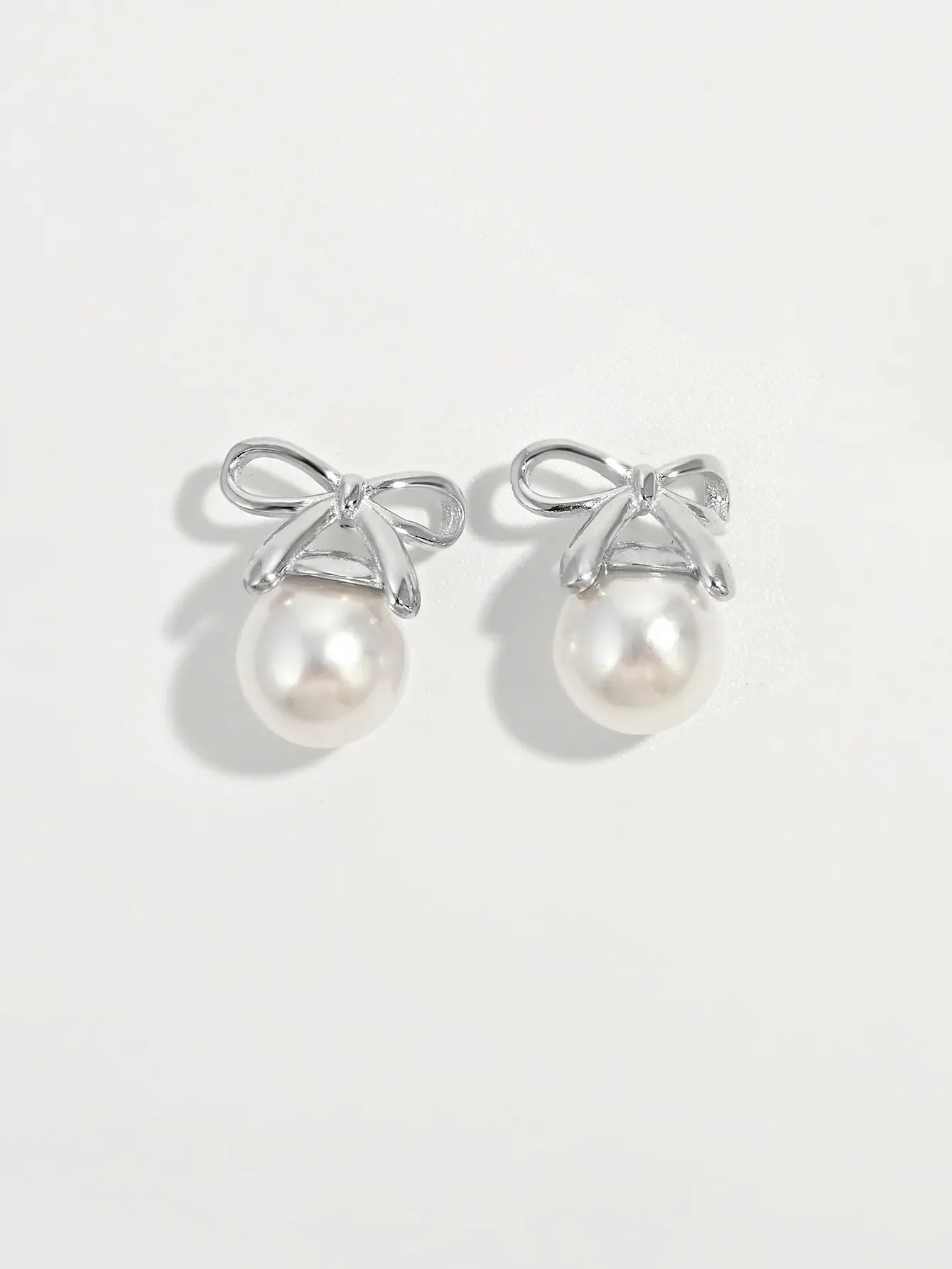 Sterling Silver Pearl Bow Earrings